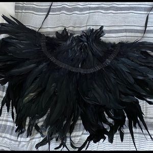 A Maleficent cape bird feathers!!